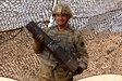 Sgt. Isaac Donaldson, an ammo sergeant assigned to Bravo Battery, 1-107th Field Artillery Regiment, 2nd Infantry Brigade Combat Team, 28th Infantry Division, Pennsylvania National Guard, carries an artillery round May 24, 2023, at Ben Ghilouf Training Area, Tunisia. Donaldson joined the Army through the buddy program 12 years ago and participated in a joint exercise for annual training in Tunisia in Spring, 2023. (U.S. Army National Guard photo by 1st Sgt. HollyAnn Nicom)