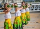 Hula dancers perform as the Navy's newest Arleigh Burke-class guided-missile destroyer, USS Frank E. Petersen Jr. (DDG 121) arrives at its new homeport, Joint Base Pearl Harbor-Hickam, after completing its maiden voyage from Charleston, South Carolina where the ship was commissioned. (U.S. Navy photo by Melvin J. Gonzalvo)