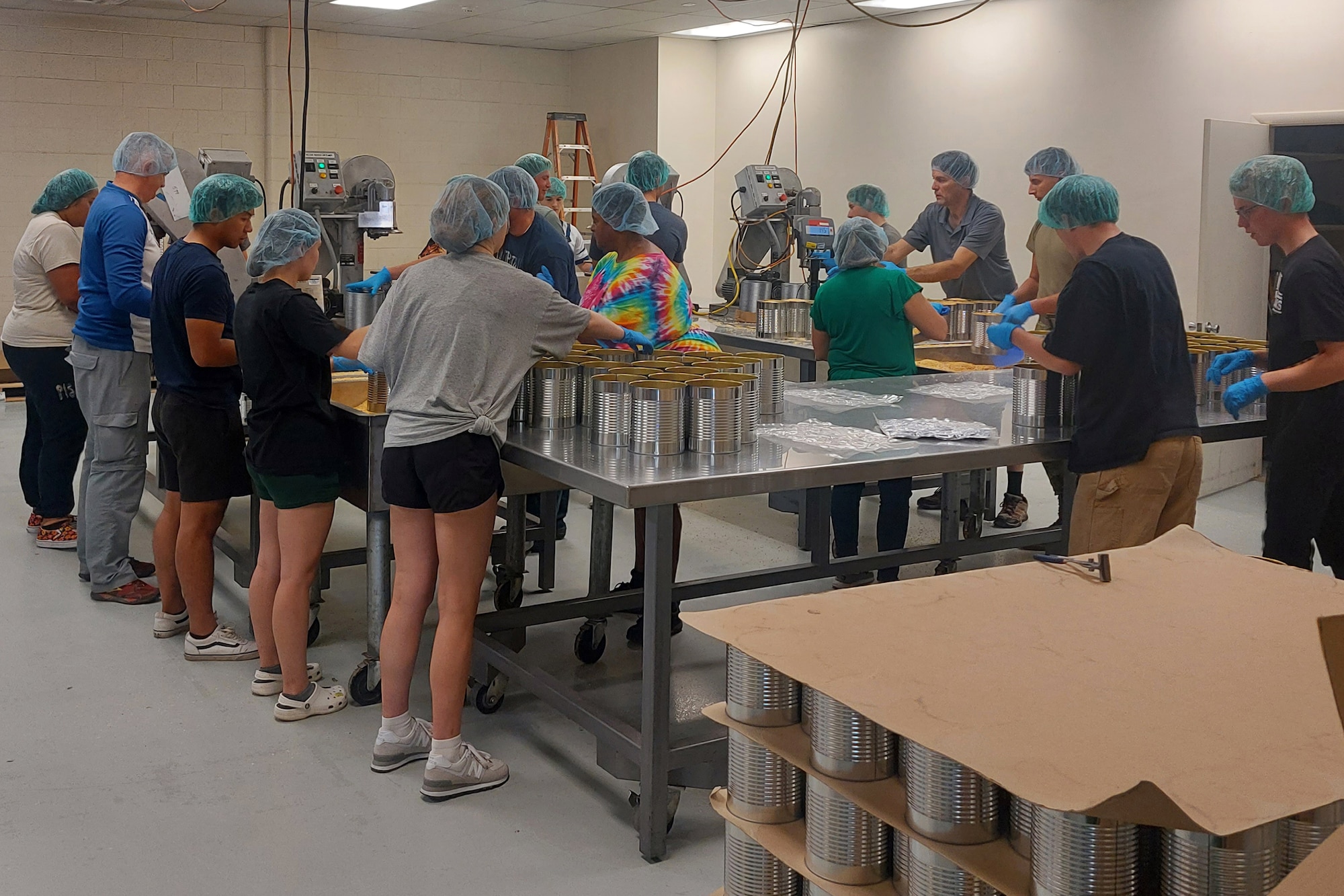 People working in a food production facility