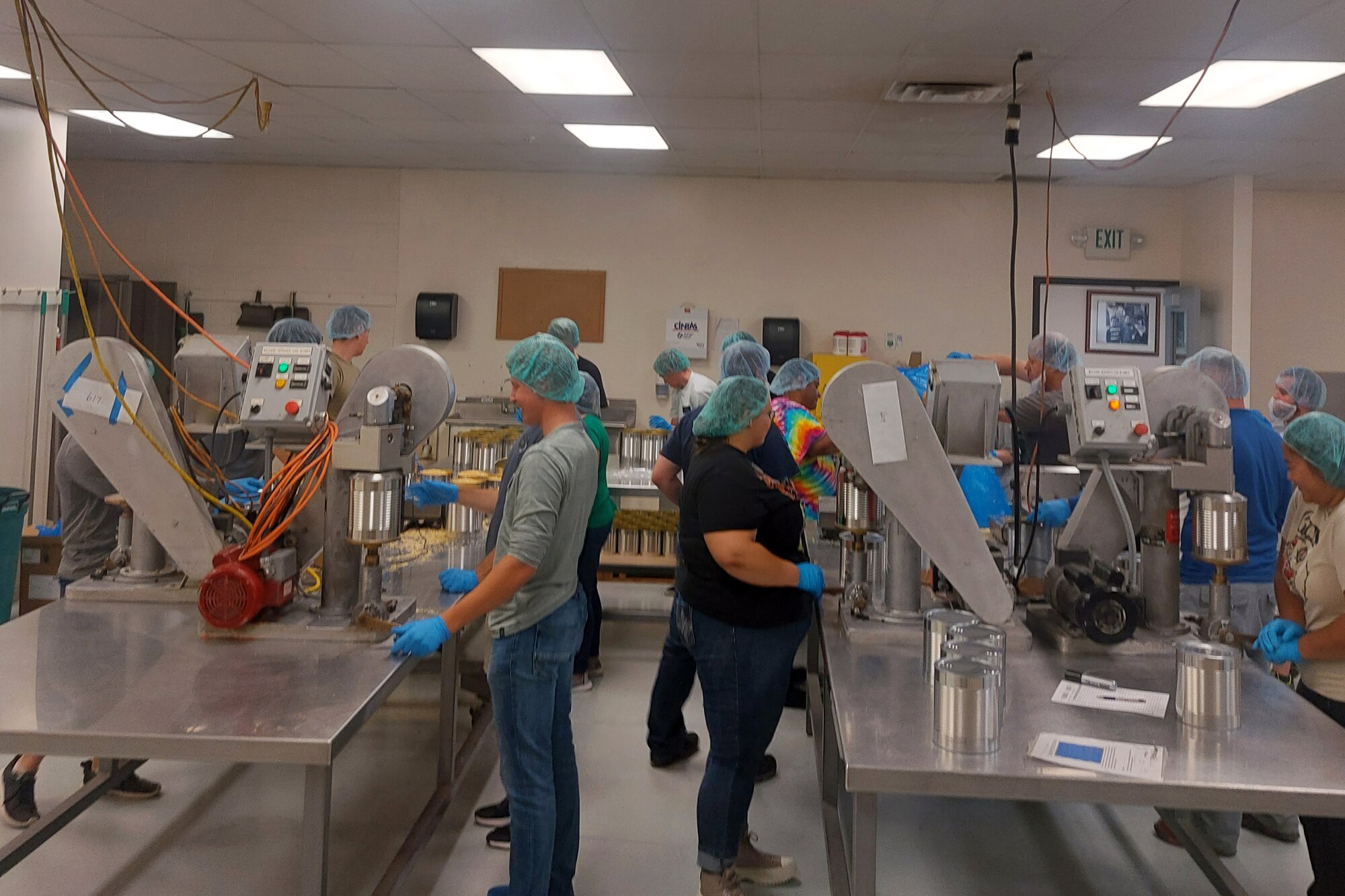 People working in a food production facility
