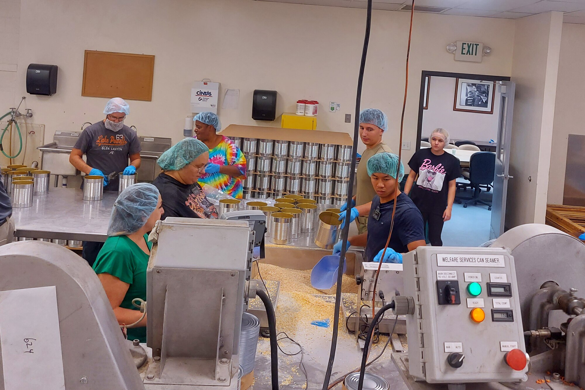 People working in a food production facility
