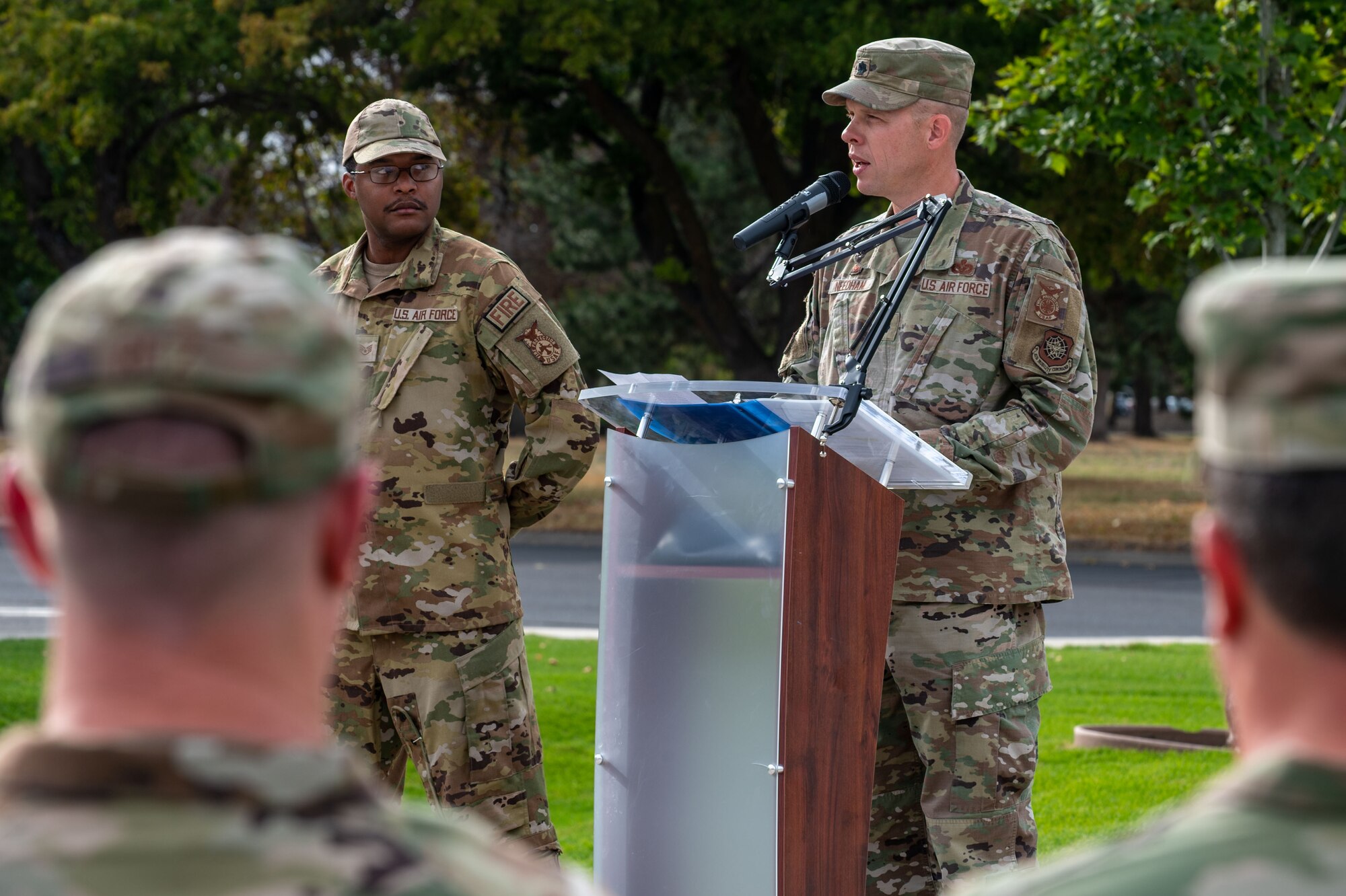 Lieutenant Colonel Jonathan Needham, 92nd Civil Engineer Squadron commander, speaks during a 9/11 Retreat Ceremony at Fairchild Air Force Base.