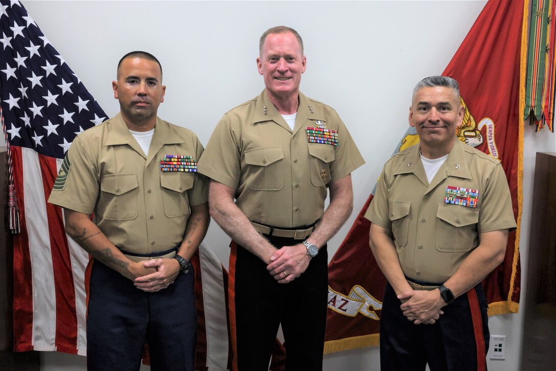 U.S. Marine Corps Sgt. Maj. Daniel A. Soto, sergeant major for Marine Corps Base (MCB) Camp Blaz, left, Lt. Gen. Edward D. Banta, deputy commandant of Installations and Logistics, center, and Col. Ernest Govea, commanding officer for MCB Camp Blaz, right, pose for a photo during Lt. Gen. Banta’s visit to MCB Camp Blaz, Guam, Sept. 11, 2023. As the Marine Corps adapts to the demands of all-domain battlefields, advancements in technology, and the challenges of peer and near-peer competition, Force Design 2030 places an emphasis on installations and their role in supporting the Marine Corps' warfighting concepts than in recent past. Lt. Gen. Banta spoke to the Marines about the future of MCB Camp Blaz and gave Marines an opportunity to ask questions. (U.S. Marine Corps photo by Lance Cpl. Garrett Gillespie)