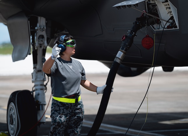 A Japan Air Self-Defense Force member refuels a F-35A Lightning II during a hot-pit refuel on Andersen Air Force Base, Guam, Aug. 28, 2023. These operations project that our regional coalition partners are evolving tactics and capabilities in order to maintain peace through deterrence. (U.S. Air Force photo by Airman 1st Class Lauren Clevenger)