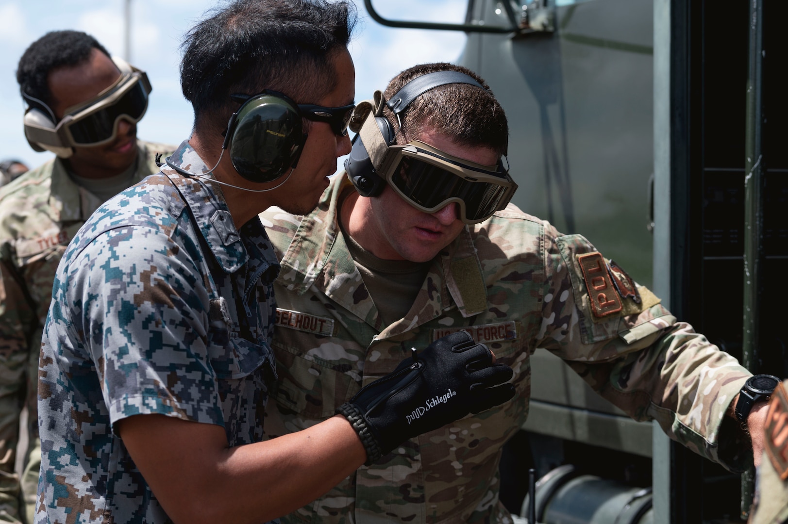 A Japan Air Self-Defense Force member refuels a F-35A Lightning II during a hot-pit refuel on Andersen Air Force Base, Guam, Aug. 28, 2023. These operations project that our regional coalition partners are evolving tactics and capabilities in order to maintain peace through deterrence. (U.S. Air Force photo by Airman 1st Class Lauren Clevenger)