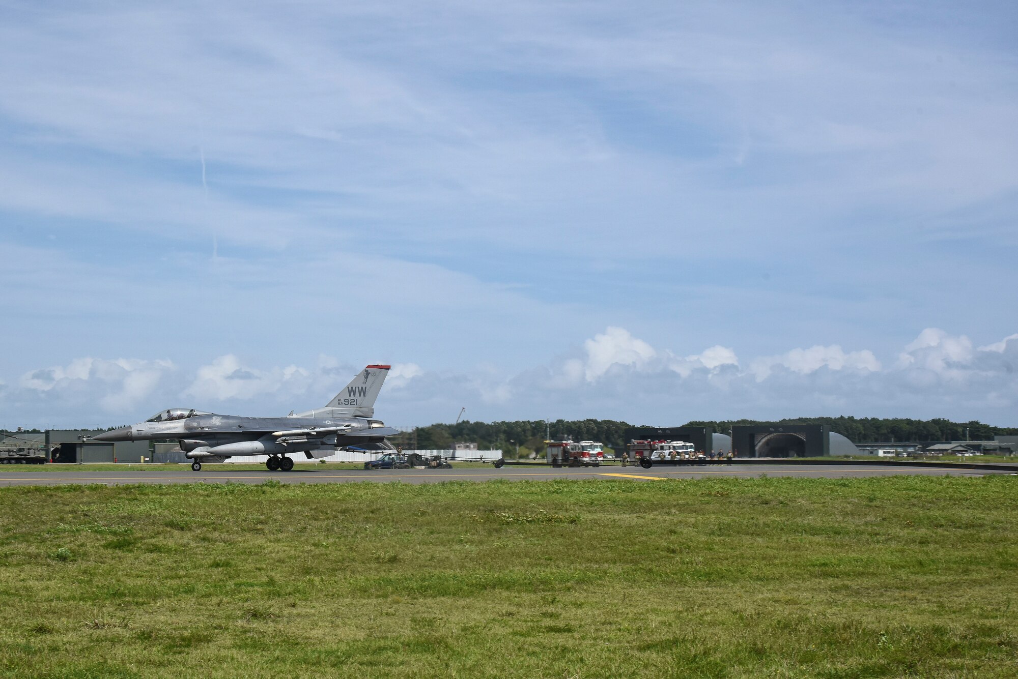 A jet takes off on the runway.