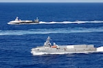 The unmanned surface vessel (USV) Ranger steams alongside the USV Mariner as both ships transit the Pacific Ocean during a photo exercise as part of Integrated Battle Problem (IBP) 23.2, Sep. 7, 2023. IBP 23.2 is a Pacific Fleet exercise to test, develop and evaluate the integration of unmanned platforms into fleet operations to create warfighting advantages. (U.S. Navy photo by Mass Communication Specialist 2nd Class Jesse Monford)