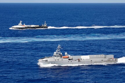 The unmanned surface vessel (USV) Ranger steams alongside the USV Mariner as both ships transit the Pacific Ocean during a photo exercise as part of Integrated Battle Problem (IBP) 23.2, Sep. 7, 2023. IBP 23.2 is a Pacific Fleet exercise to test, develop and evaluate the integration of unmanned platforms into fleet operations to create warfighting advantages. (U.S. Navy photo by Mass Communication Specialist 2nd Class Jesse Monford)