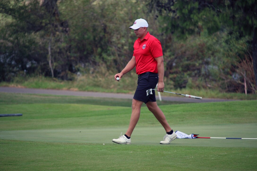 Marine Corps Capt. Nicholas Brediger of Charlottesville, VA. shown here aftering tying the course record of 65 on day 1 of the 2023 Armed Forces Golf Championship. 2023 marks the 75th anniversary of Armed Forces Golf. This year, Naval Base San Diego hosts the championship at the Admiral Baker Golf Course, featuring teams from the Army, Marine Corps, Navy, and Air Force (with Space Force players); and for the first time as a stand alone team, the U.S. Coast Guard.  Department of Defense Photo by Mr. Steven Dinote - Released.