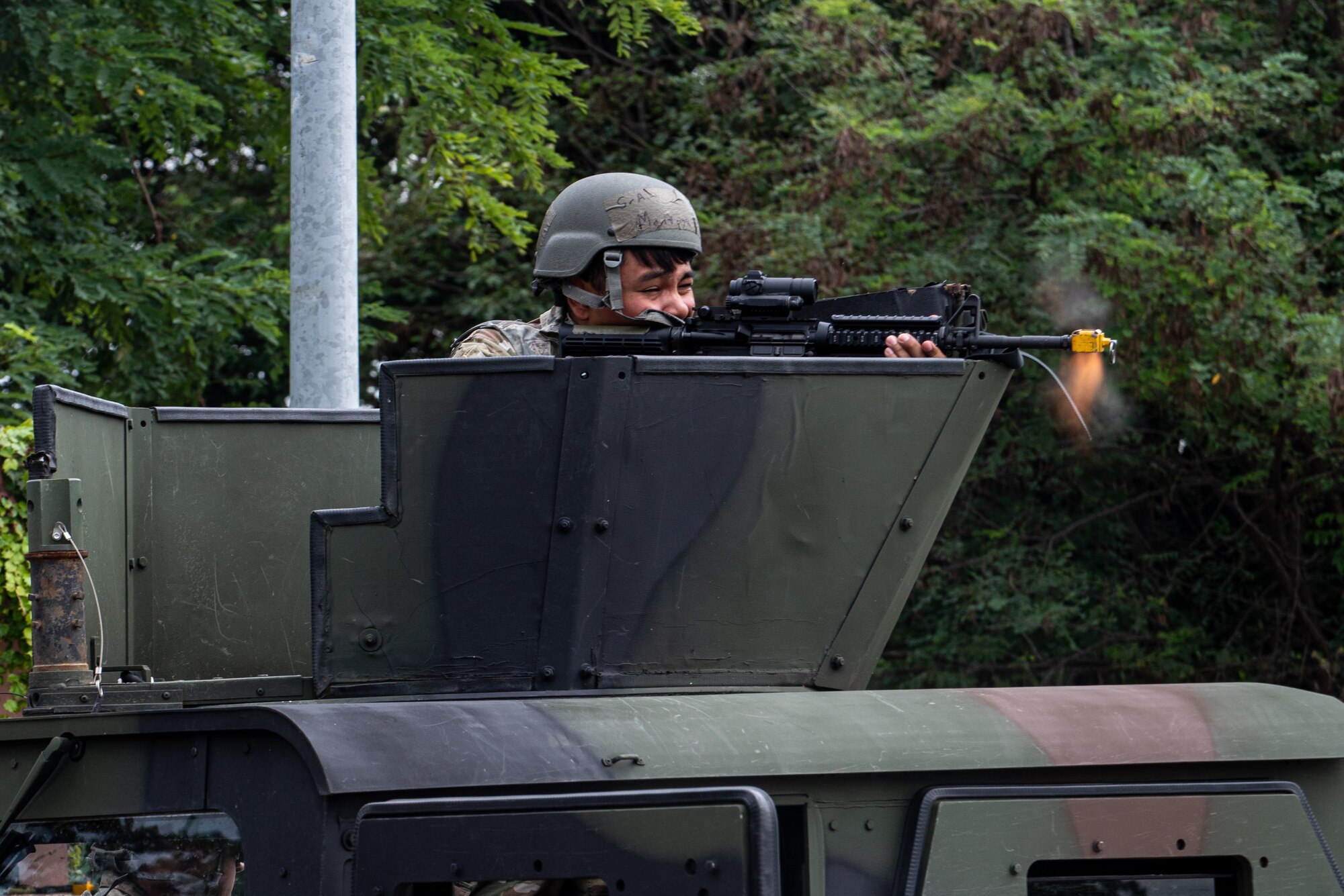 U.S. Air Force Senior Airman Erick Montoya, 51st Fighter Wing paralegal, returns fire during a simulated attack at Osan Air Base, Republic of Korea, Sept. 21, 2023. Augmenting multi-capable Airmen as security forces allows the 51st Fighter Wing to bolster its defenses and effectively counter any threat to Osan or the Republic of Korea. (U.S. Air Force photo by Airman 1st Class Chase Verzaal)