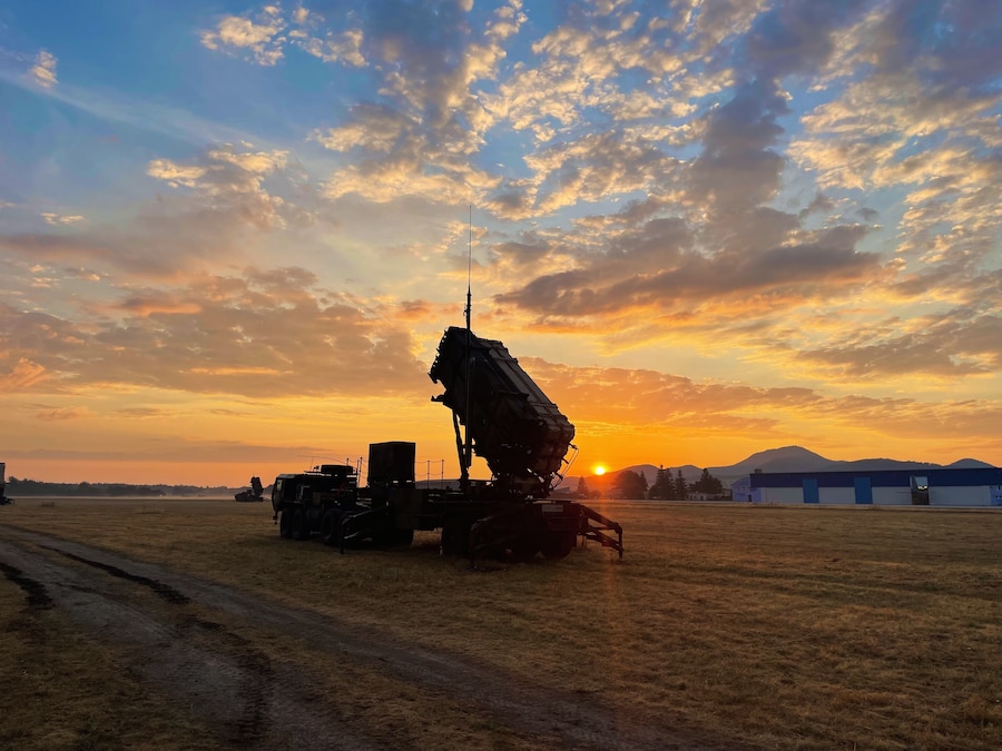 The sun rises over a 10th AAMDC Patriot missile launcher in Slovakia on July 27. Bravo Battery, 5-7 Air Defense Artillery is preparing for crew qualification tables and NATO readiness evaluations in the coming weeks while deployed to Slovakia providing increased air defense capacity and capability along NATO's Eastern flank. (U.S. Army photo by 2nd Lt. Emily Park)