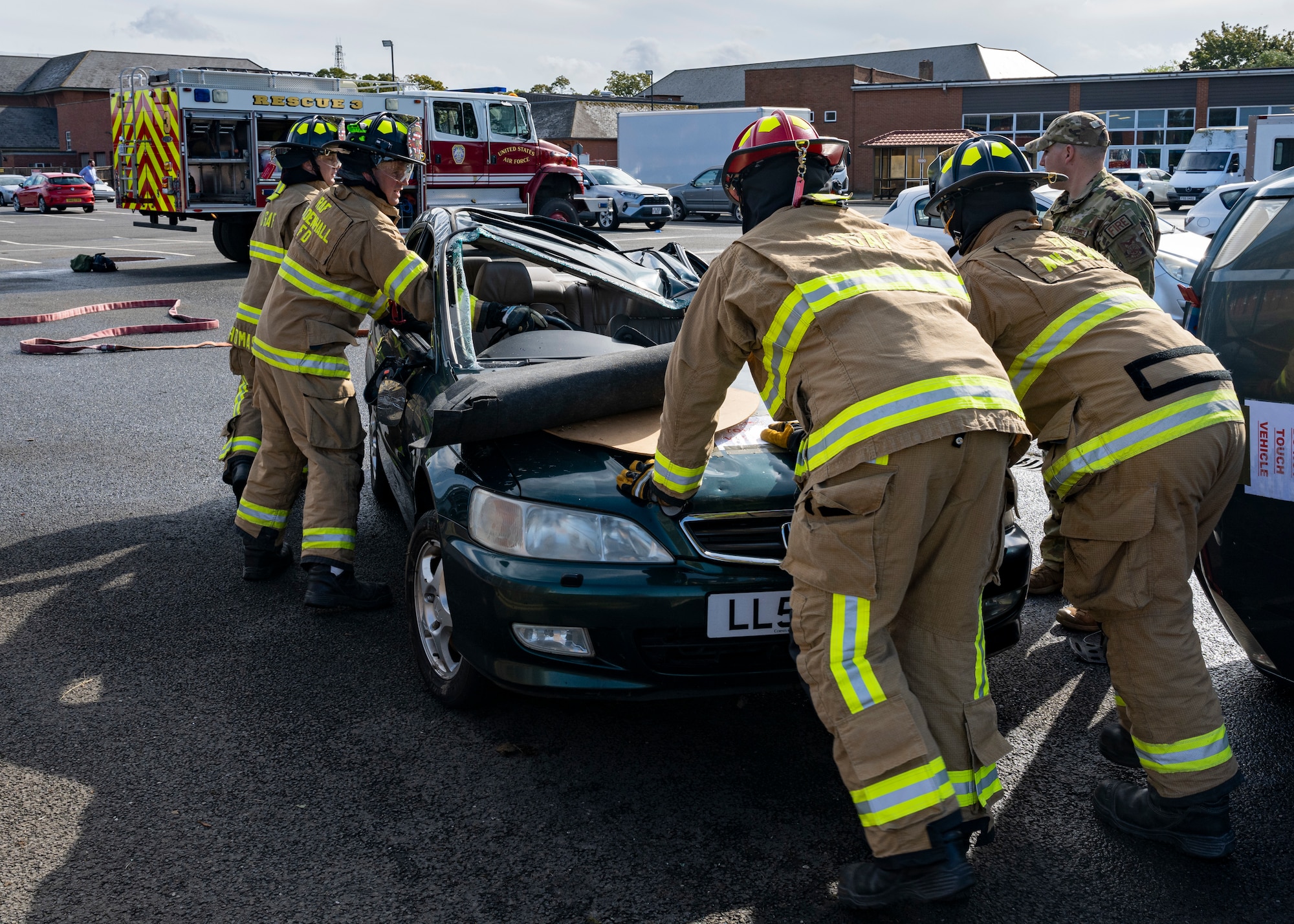 The exercise allowed 100th CES firefighters to use their expertise to perform a vehicle extraction where simulated mannequins are trapped in a wrecked vehicle.
