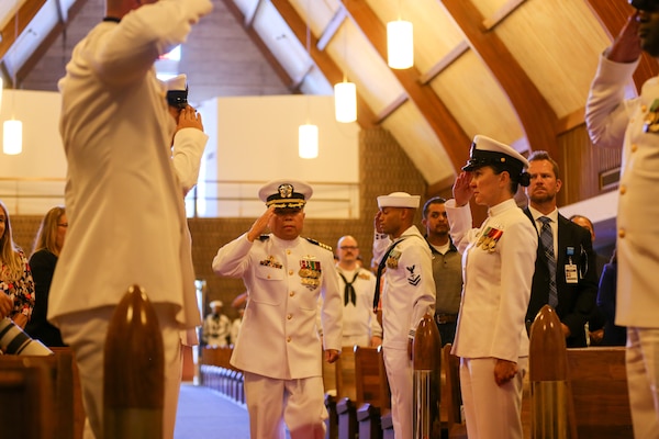 Capt. Romeo Tizon, Jr. arriving at Change of Command Ceremony located at the Naval Air Station Lemoore chapel.