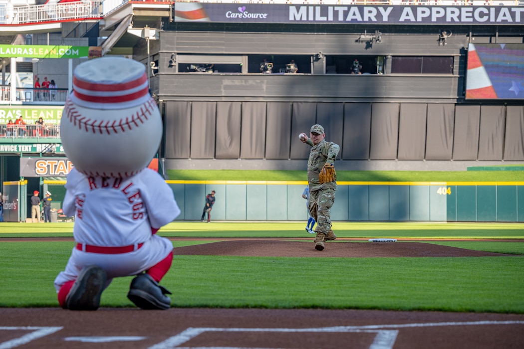 Col. Meeker throws the ceremonial first pitch