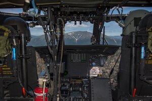 Stock image cockpit view from a UH-60 helicopter approaching Mount Katahdin in Baxter State Park, Maine. The Maine National Guard hoisted an injured hiker to safety Sept. 20, 2023.