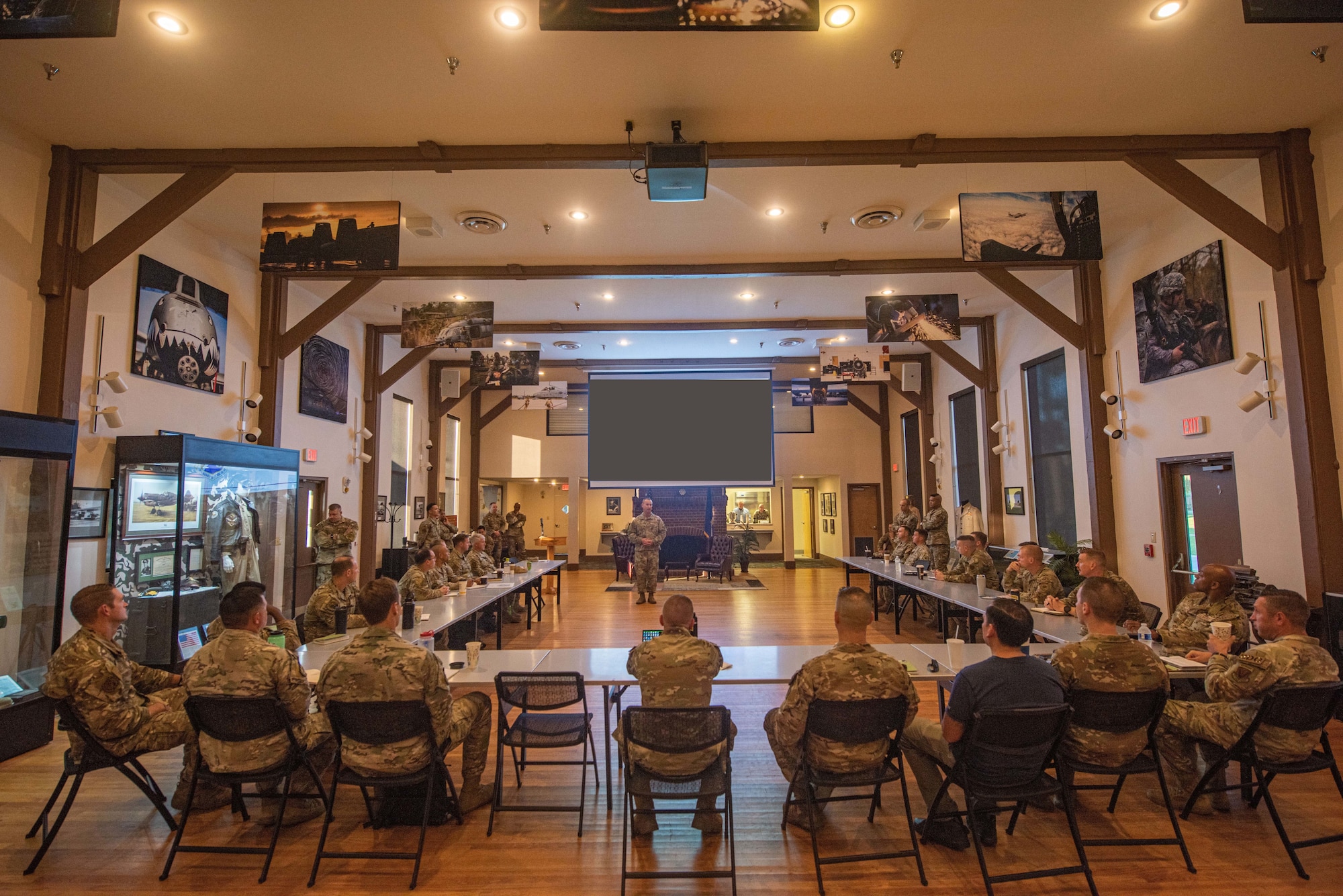 U.S. Air Force Col. Tim Hood, 93rd Air Ground Operations Wing commander, briefs senior leaders as part of their Commander’s Conference, Sept. 19, 2023, at Moody Air Force Base, Georgia. The 93rd AGOW used the conference as a meaningful opportunity for their geographically separated units to gather in one place and coordinate their efforts as leaders. (The slide has been redacted for OPSEC purposes) (U.S. Air Force photo by Airman 1st Class Sir Wyrick)