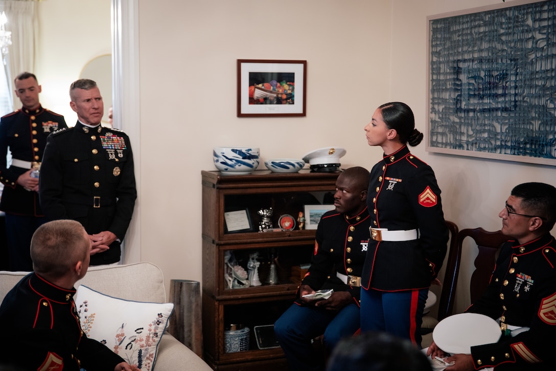 U.S. Marine Corps Cpl. Sophia Green, a systems engineer specialist, assigned to Alpha Co., Intelligence Support Battalion, Marine Forces Reserve, and a participant in the Marine Forces Reserve Diversity AIMED Officer Program (DAOP), speaks to Gen. Eric Smith, Assistant Commandant of the Marine Corps, at Marine Barracks Washington, D.C., Aug 19, 2022. DAOP provides enlisted Marines with the opportunity to see the process of commissioning in the Marine Corps firsthand so that they can make informed decisions on a potential career as an Officer. (U.S. Marine Corps Photo by Cpl. James Stanfield)