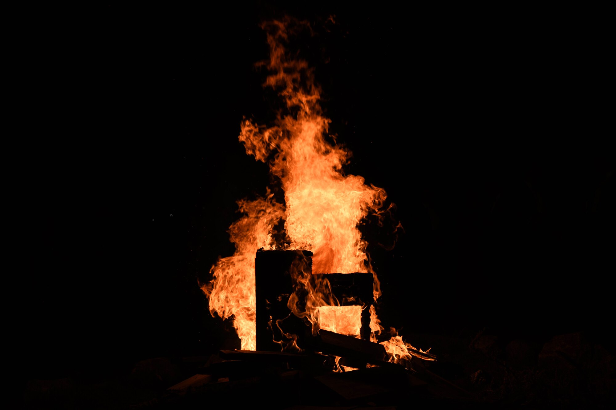Piano is engulfed in flames.