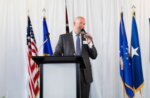 Special Agent (Major) Jason VanOverbeke, Individual Mobilized Augmentee to the Air Force Office of Special Investigations, Investigations, Collections and Operations Nexus (ICON) Center, speaks during heritage dinner hosted by his organization, May 14, 2022. Vanoverbeke serves as the Board President of the Twin Cities Area United States Air Force Academy Association Graduates. The heritage dinner is one of many events he and his team put together to support veterans in his local community. (Courtesy photo)
