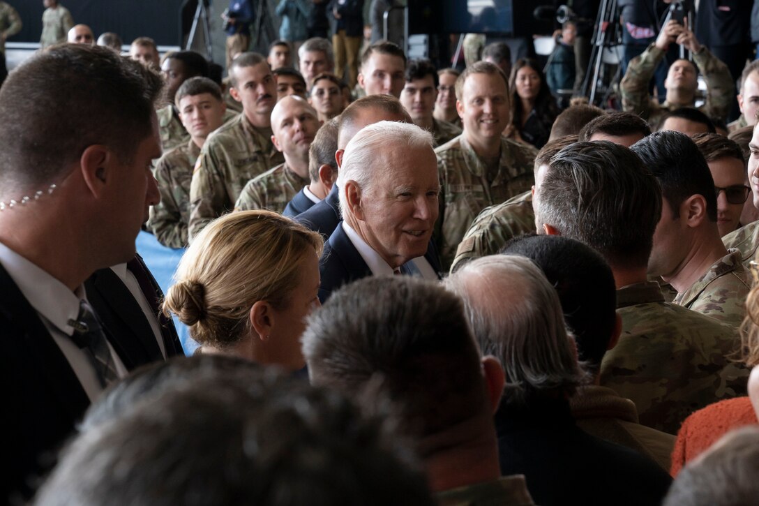 President Joe Biden meets service members after commemorating the 22nd anniversary of the terrorist attacks of 9/11 during a remembrance ceremony