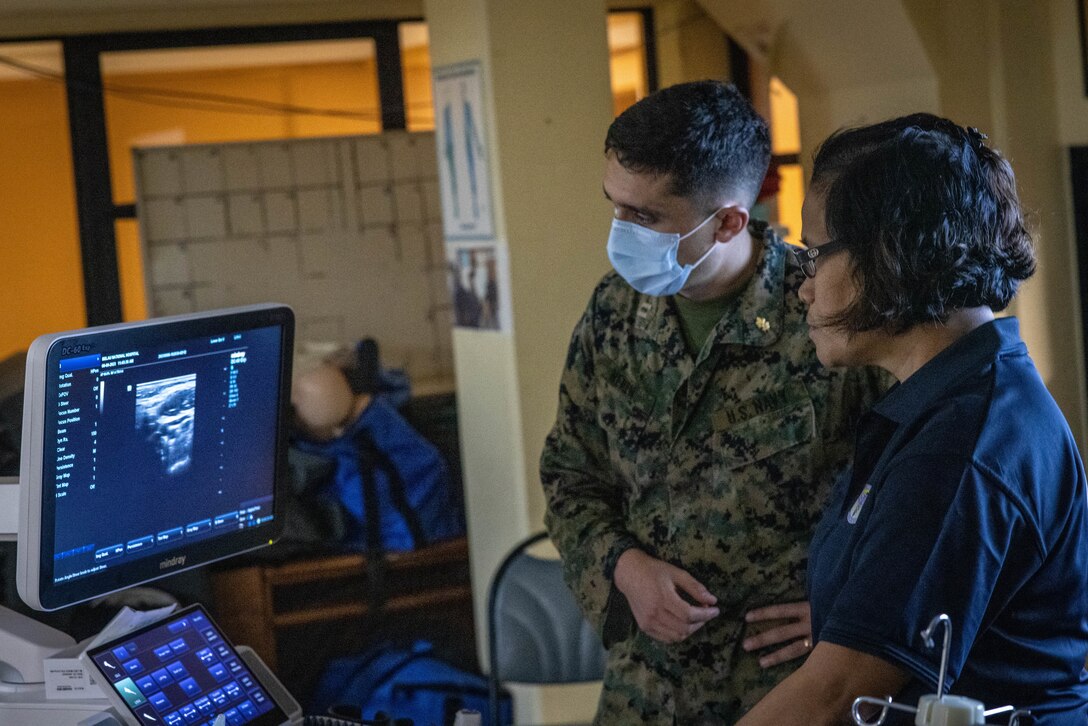 Dr. Yuriko Bechesrrak, a Pediatric Physician at Belau National Hospital and U.S. Navy Lt. Daniel Neren, an Emergency Medicine Physician with Marine Corps Engineer Detachment 23.2 participate in point of care ultrasound training at Belau National Hospital on Koror, Republic of Palau, Sept. 8, 2023. The United States and the Republic of Palau continue to enhance interoperability by providing regional security, real-world training and community relations projects while forward deployed in the Indo-Pacific area of responsibilities during MCED – Palau 23.2. (U.S. Marine Corps photo by SSgt. David Bickel)