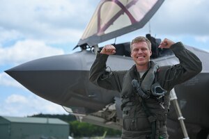 U.S. Air Force Maj. Joshua Hammervold, an F-35A Lightning II student instructor pilot with the 58th Fighter Squadron prepares to fly an F-35A for a training mission during exercise Northern Lightning at Volk Field Air National Guard Base, Wisconsin, Aug. 11, 2023.
