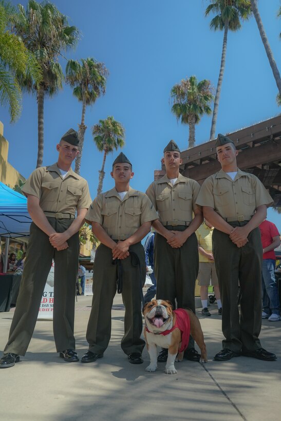 U.S. Marine Corps Pvt. Bruno, the mascot of Marine Corps Recruit Depot San Diego, Western Recruiting Region, poses with new Marines of Charlie Company, 1st Recruit Training Battalion, at MCRD San Diego, Sept. 7, 2023. The mascots job is to boost morale, participate in outreach work, and attend events and ceremonies. (U.S. Marine Corps photo by Lance Cpl. Francisco Angel)