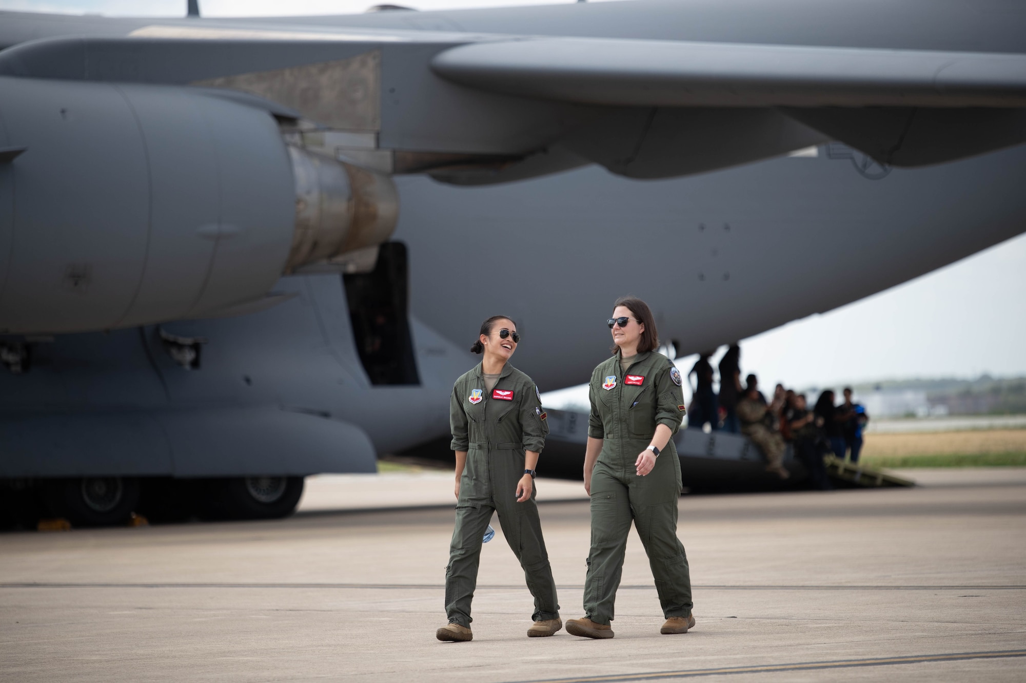 U.S. Air Force Capt. Jessica Williams and 1st Lt Gabrielle Giuliano, MQ-9 Reaper pilots assigned to the 867th Attack Squadron at Creech Air Force Base arrive at the Torch Athena Girls in Aviation Day Celebration, Joint Base San Antonio-Lackland Kelly Field, Texas, Sept. 21, 2023. About 400 local students attended the event, which showcased women from across Air Education and Training Command and their aircraft. The women represented various career fields, such as pilots, maintainers and boom operators.