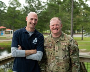 Two men posing for portrait