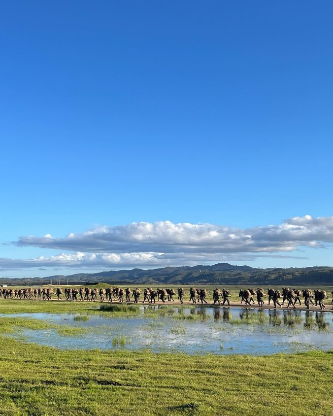 Marines with HQ Company, 23d Marine Regiment hold a squad competition