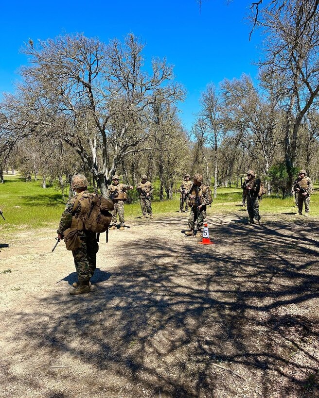 Marines with HQ Company, 23d Marine Regiment hold a squad competition