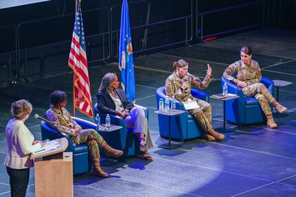 U.S. Air Force Chief Master Sgt. Janee Walker, Air Education and Training Command security forces manager, speaks during a panel discussion during the Torch Athena Rally and Fly-In, San Antonio, Texas, Sept. 19, 2023. The three-day event aims to leverage education to enact change and inspire diverse female warfighter Airmen of the future. (U.S. Air Force photo by Thomas Coney)