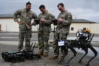 Airman control robot dogs with tablets
