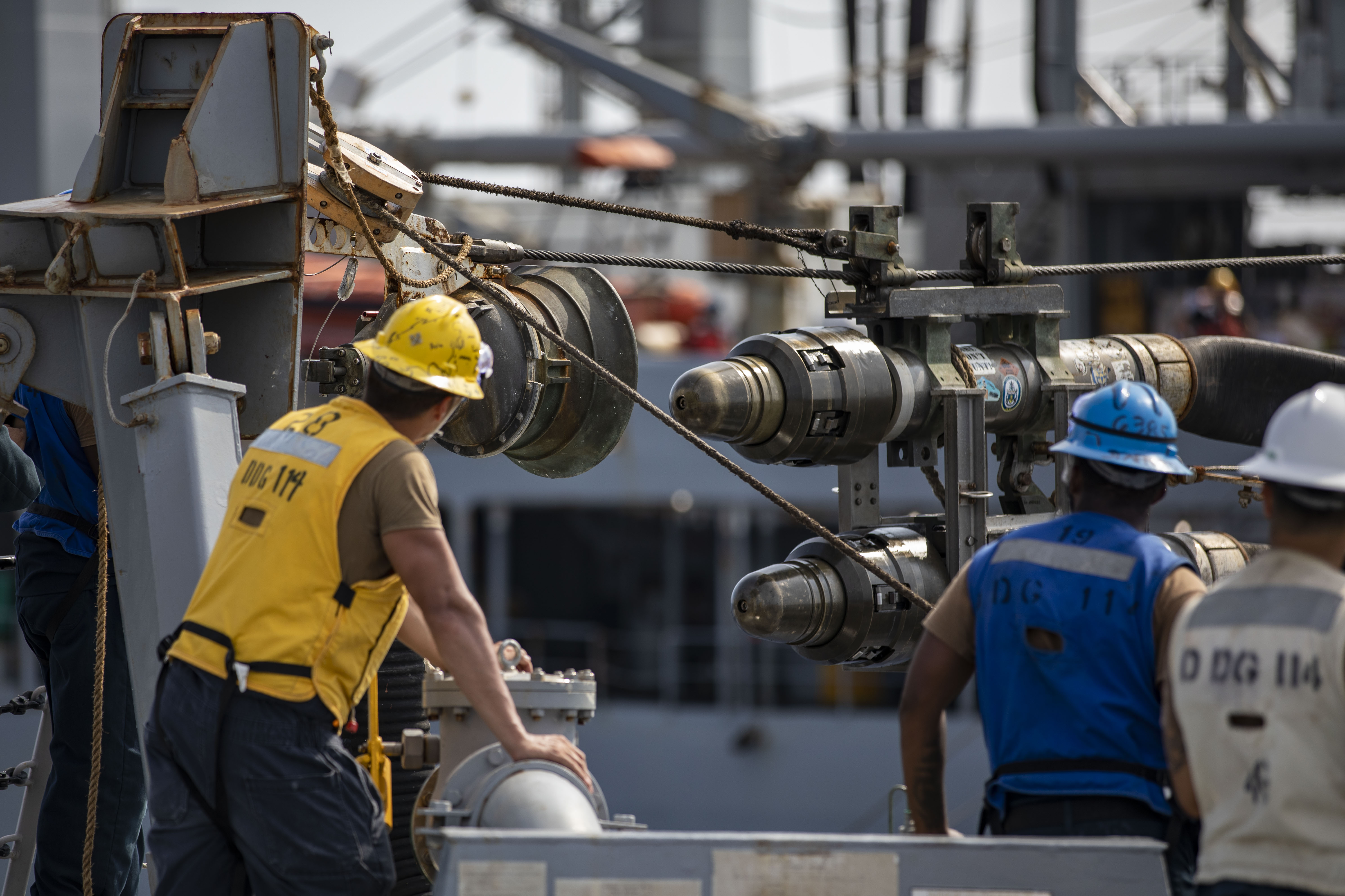 USS Ralph Johnson (DDG 114) replenishment-at-sea with the USNS Yukon (T-AO-202) in the South China Sea.