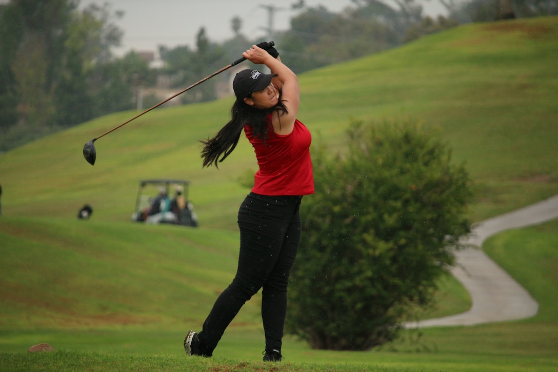 Air Force 1st Lt. Kimberly Liu of Minot AFB, N.D. jumps into second place. 2023 marks the 75th anniversary of Armed Forces Golf. This year, Naval Base San Diego hosts the championship at the Admiral Baker Golf Course, featuring teams from the Army, Marine Corps, Navy, and Air Force (with Space Force players); and for the first time as a stand alone team, the U.S. Coast Guard.  Department of Defense Photo by Mr. Steven Dinote - Released.