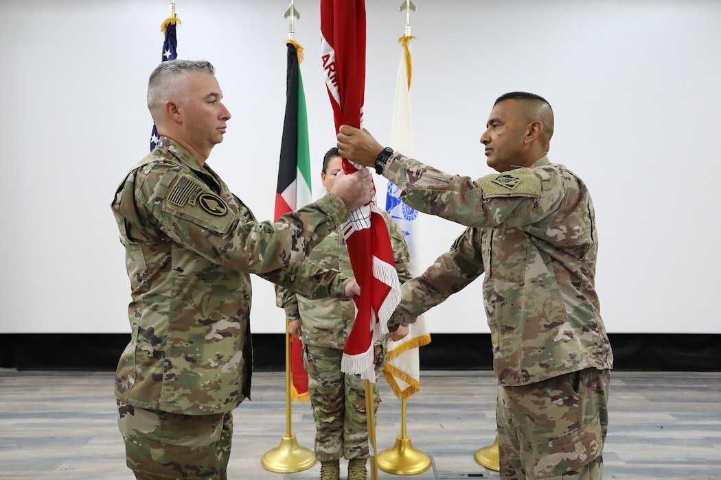 The Transatlantic Expeditionary District gained a new senior leader Aug. 9 during an Assumption of Responsibility Ceremony at Camp Arifjan, Kuwait. In a time-honored military tradition, Sgt. Maj. David Kluba assumed the roles and responsibilities of the district's senior enlisted advisor as the district's distinctive red and white colors were passed to him by Expeditionary District Commander Col. Mohammed Rahman, who said that he is encouraged that Kluba is now the custodian of the district's colors.