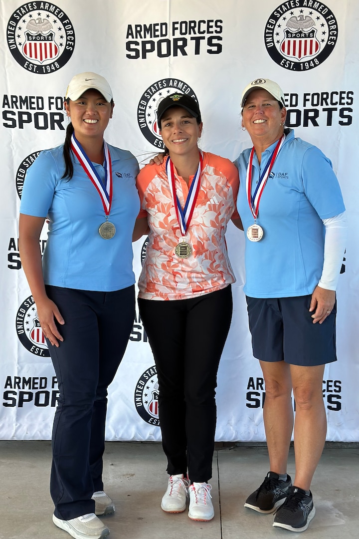 Top finishers of the 2023 Armed Forces Golf Championship. From left to right:  Bronze Medalist Air Force 1st Lt. Kimberly Liu; Gold Medalist Army Capt. Melanie De Leon, and Silver Medalist Lt Col. Linda Jeffery. 2023 marks the 75th anniversary of Armed Forces Golf. This year, Naval Base San Diego hosts the championship at the Admiral Baker Golf Course, featuring teams from the Army, Marine Corps, Navy, and Air Force (with Space Force players); and for the first time as a stand alone team, the U.S. Coast Guard.  Department of Defense Photo by Ms. Theresa Smith - Released.