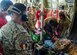 U.S. Air Force service members assigned to the 405th Expeditionary Aeromedical Evacuation Squadron assigned to the 386th Air Expeditionary Wing, demonstrate proper patient security on a C-130J Super Hercules in support of exercise Bright Star 23, Sept. 10, 2023. Bright Star 23 is a multilateral U.S. Central Command exercise held with the Arab Republic of Egypt across air, land, and sea domains that promotes and enhances regional security and cooperation, and improves interoperability in irregular warfare against hybrid threat scenarios. (U.S. Air Force photo by Tech. Sgt. Isaac Garden)