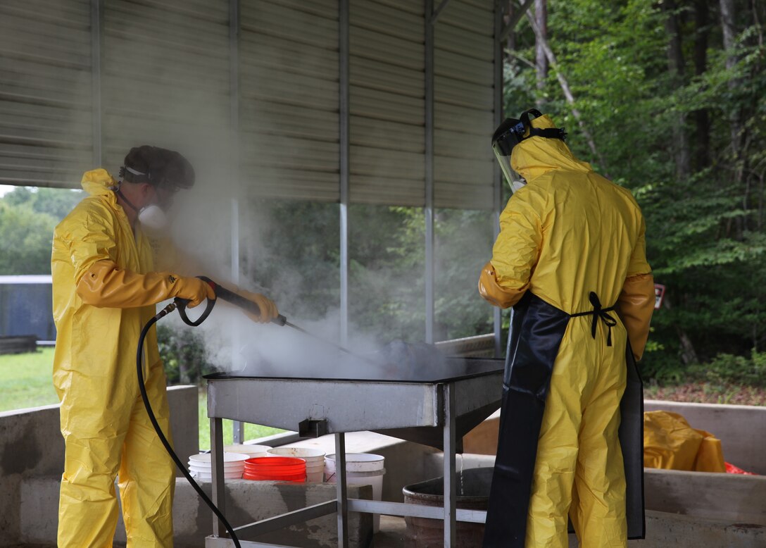 U.S. Navy Explosive Ordnance Disposal (EOD) Expeditionary Exploitation Unit One (EXU-1) alongside the U.S. Marine Corps 3d Littoral Logistics Battalion EOD conduct a Joint Disassemble and Exploitation Training steam out at U.S. Marine Corps Base Quantico, Virginia, August 15.
(U.S. Navy photo by Holly Dodds)