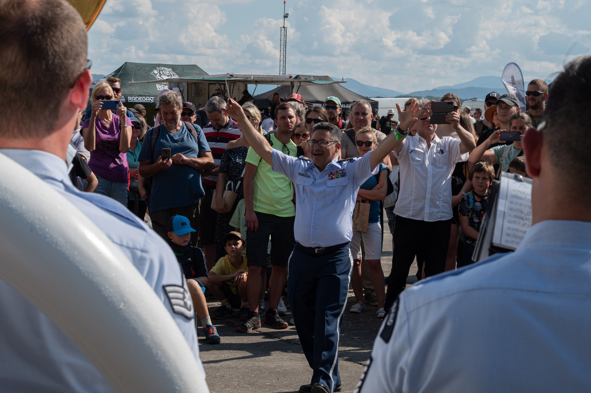 U.S. Air Force Maj. Rafael F. Toro-Quiñones, U.S. Air Forces in Europe Band commander and conductor, conducts during a performance during the NATO Days event at Leoš Janáček Airport in Ostrava, Czech Republic, Sept. 17, 2023.