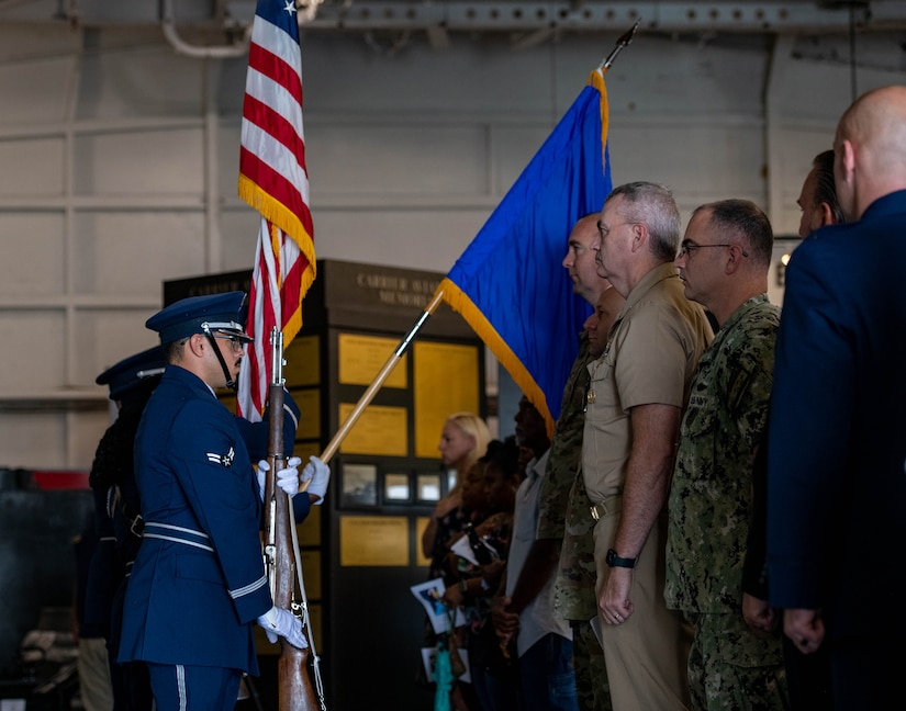 Joint Base Charleston Honor Guard presents the colors during the Bells Across America ceremony aboard the decommissioned aircraft carrier USS Yorktown