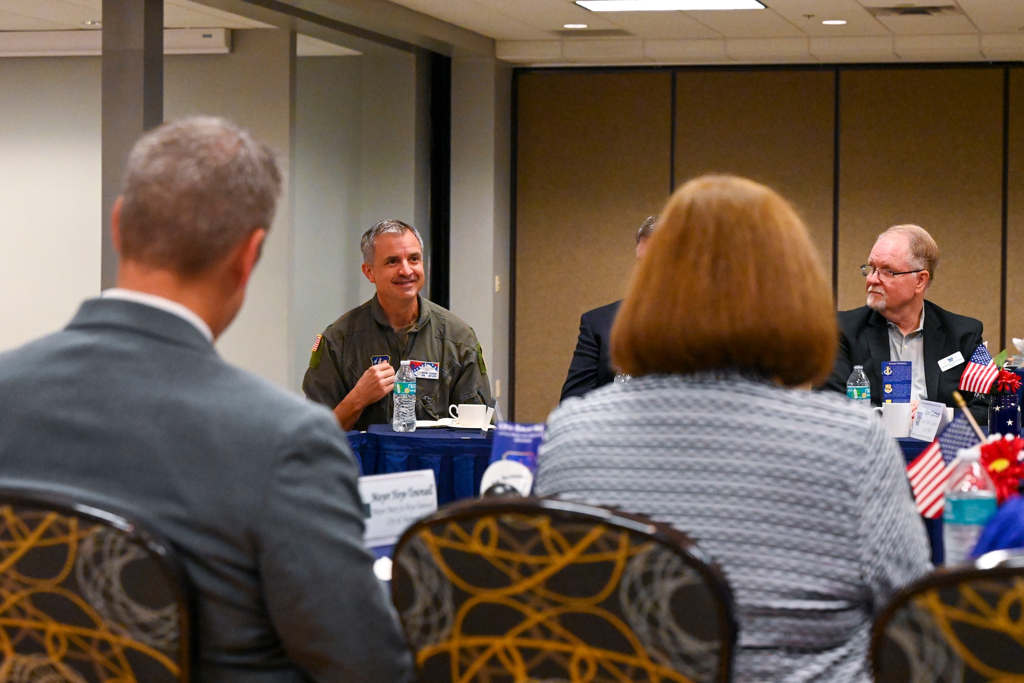 Col. Patric Coggin, 189th Airlift Wing commander, speaks with local Arkansas mayors and elected officials during a breakfast