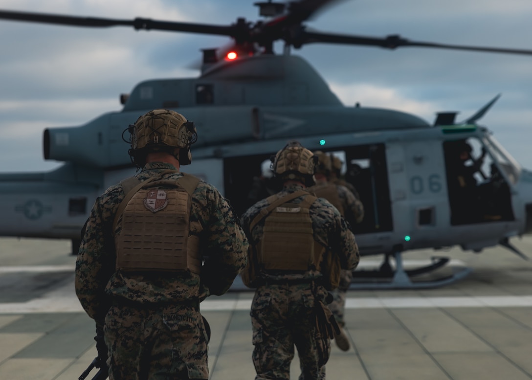 U.S. Marines with 1st Air Naval Gunfire Liaison Company, I Marine Expeditionary Force Information Group, board a UH-1Y Venom for fast rope training during ANGLICO Basic Skills Package at Marine Corps Base Camp Pendleton, California, Sept. 13, 2023. The goal of the Basic Skills Package is to provide ANGLICO Detachments with advanced training on infantry skills, machine gun employment, Helicopter Rope Suspension Technique, digital communication, and fires planning at the battalion operational level.