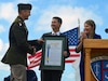 Southern California U.S. Army Recruiting Battalion Commander Lt. Col. Matthew Upperman, left, receives the California State Assembly Declaration of Southern California Army Recruiting Month from State Assemblymembers Chris Ward, center and Tasha Boerner, right, on the deck of the USS Midway Museum in San Diego Sept. 18, 2023. The declaration kicked off seven days of consecutive Army Recruiting Events in San Diego and will continue through Oct. 27, 2023, with recruiting events in Orange, Riverside, and San Bernardino Counties.