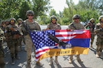 Soldiers from the Kansas National Guard and 1st Brigade Combat Team, 101st Airborne Division (Air Assault), Task Force Mountain, hold a closing ceremony for Eagle Partner 2023 Sept. 20, 2023, in Armenia. The exercise between U.S. Army Europe and Africa and Armenian forces aimed to fortify the alliance with Armenia while bolstering interoperability and readiness via specialized peacekeeping operations training.