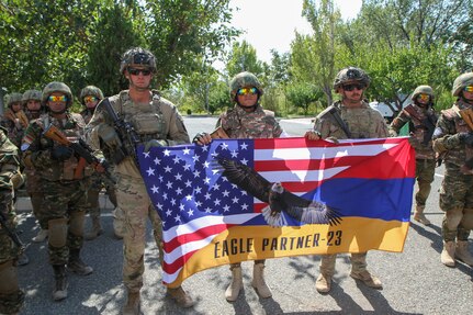 Soldiers from the Kansas National Guard and 1st Brigade Combat Team, 101st Airborne Division (Air Assault), Task Force Mountain, hold a closing ceremony for Eagle Partner 2023 Sept. 20, 2023, in Armenia. The exercise between U.S. Army Europe and Africa and Armenian forces aimed to fortify the alliance with Armenia while bolstering interoperability and readiness via specialized peacekeeping operations training.