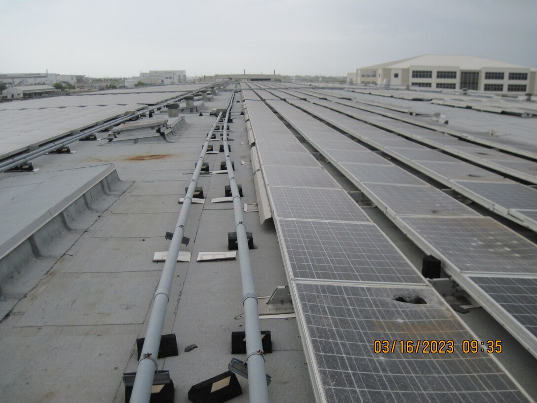 Solar panels on a building at Naval Air Station Corpus Christi, Texas, show signs of damage following Hurricane Harvey in August 2017. Their restoration is one of many projects resulting from the Navy’s expanded partnership with Huntsville Center’s Resource Efficiency Manager Program.