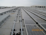 Solar panels on a building at Naval Air Station Corpus Christi, Texas, show signs of damage following Hurricane Harvey in August 2017. Their restoration is one of many projects resulting from the Navy’s expanded partnership with Huntsville Center’s Resource Efficiency Manager Program.