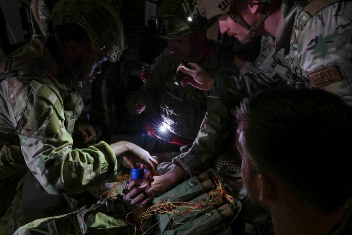 U.S. Air Force Civil Engineer Squadron explosive ordnance disposal technicians defuse an improvised explosive device during a simulated hostage situation Sept. 21, 2023, at Beale Air Force Base, California.
