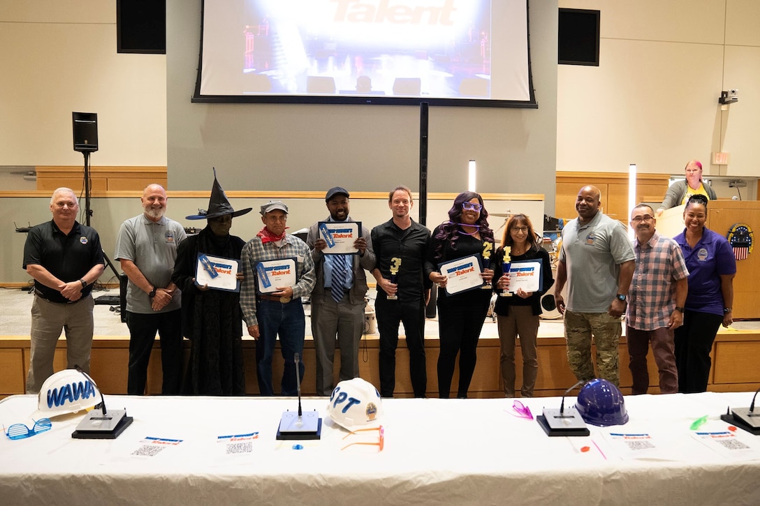 Troop Support’s Got Talent competitors and judges pose after the award presentation in Philadelphia on Sept. 21. The competition was held to encourage employee participation in the 2023 Defense Logistics Agency Culture Climate Survey. (Dod photo by Ed Maldonado)